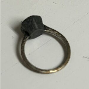 Antique ring with etching and a stone